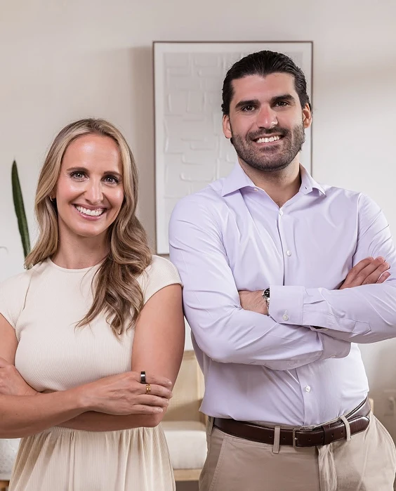 Dr. Emily Dennison and Dr. Daniel Hazimah posing for a photo
