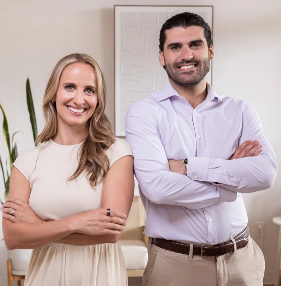 Dr. Emily Dennison and Dr. Daniel Hazimah posing for a photo