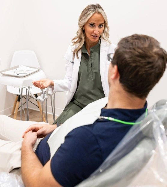 Dentist consulting with a patient about bad breath treatment