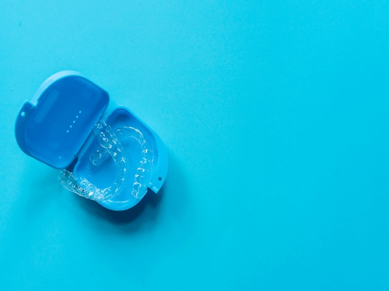 Clear aligners in an open storage case