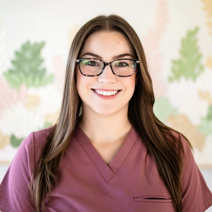 Portrait of Kaitlyn, a friendly team member at the dental practice