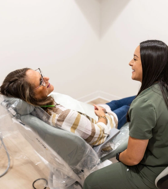 New patient consulting with a dental professional during a visit