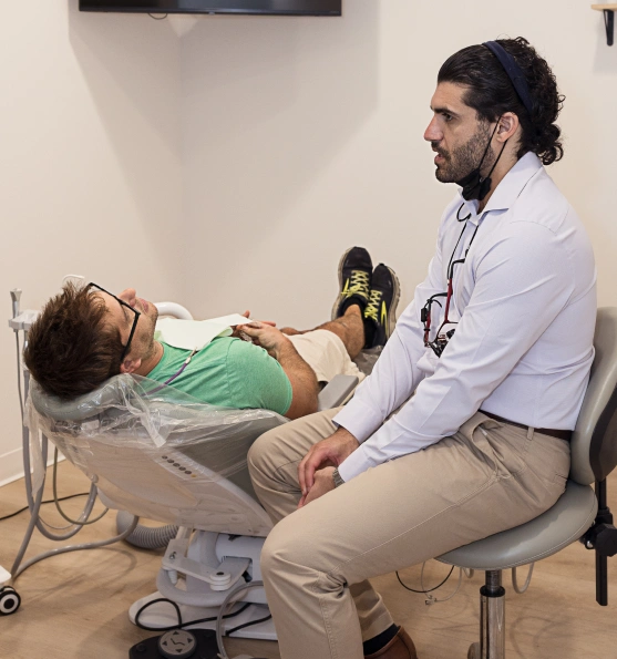 Dentist consulting with a patient about sleep apnea treatment